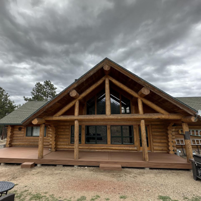 Front view of a home with coordinated deck color