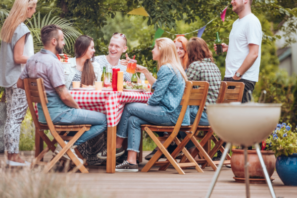 Backyard deck with people socializing