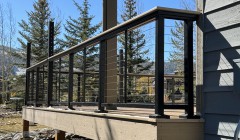 Trex® composite deck with black metal and cable railing